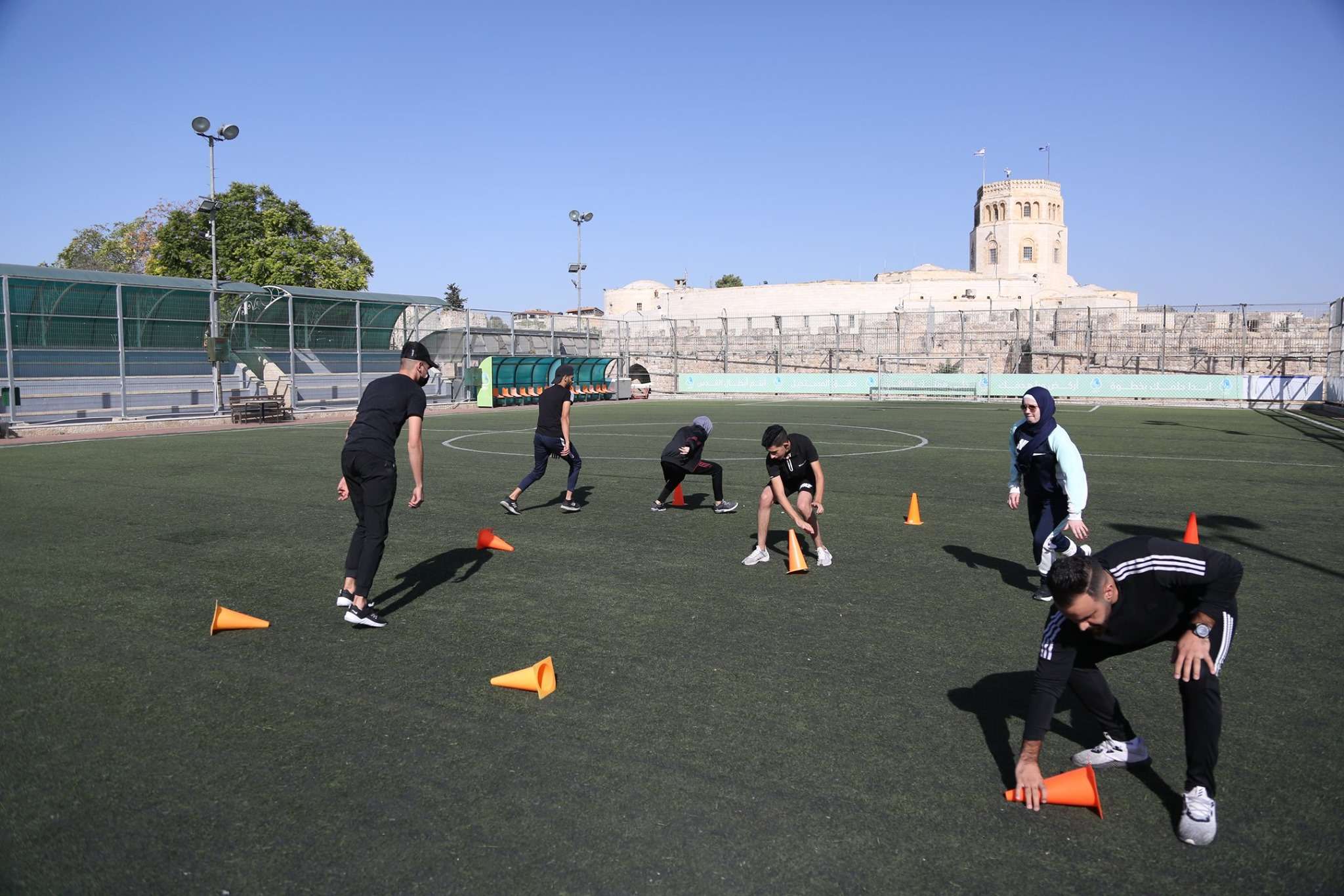Al-Quds University resumes the practical educational course In the playgrounds of Burj Alluqluq Social Center Society